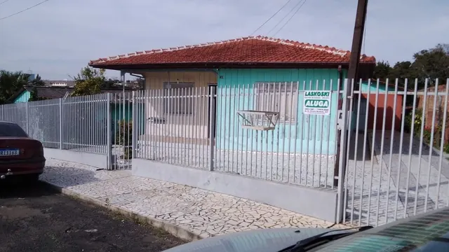 Terreno de 702 m² com casa de madeira no Centro à venda em Irati, foto 3