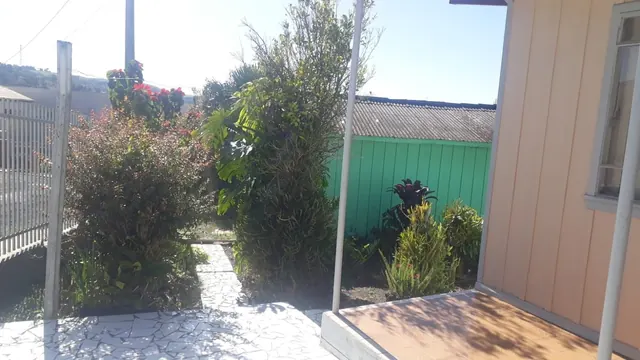Terreno de 702 m² com casa de madeira no Centro à venda em Irati, foto 4