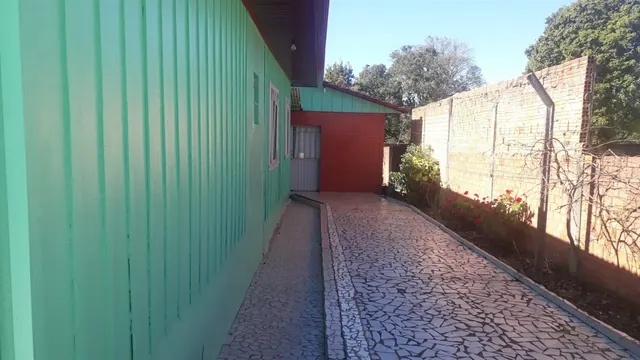 Terreno de 702 m² com casa de madeira no Centro à venda em Irati, foto 5